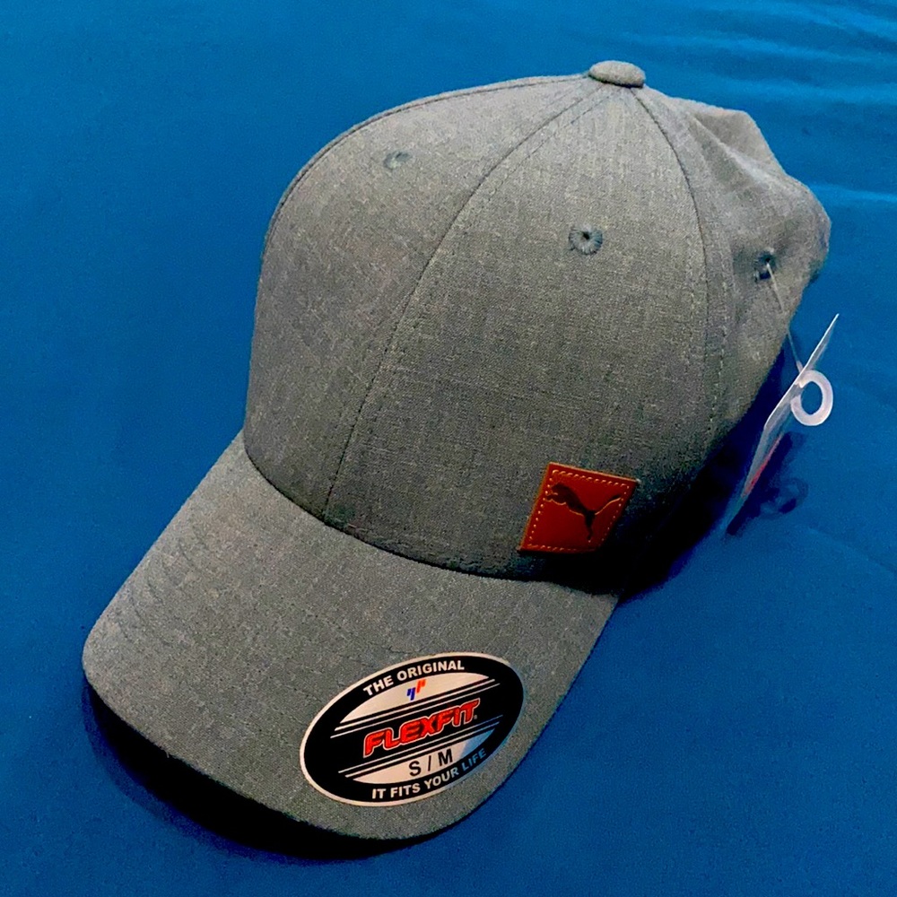 Brand new Puma cap never used have tags. Size S/M